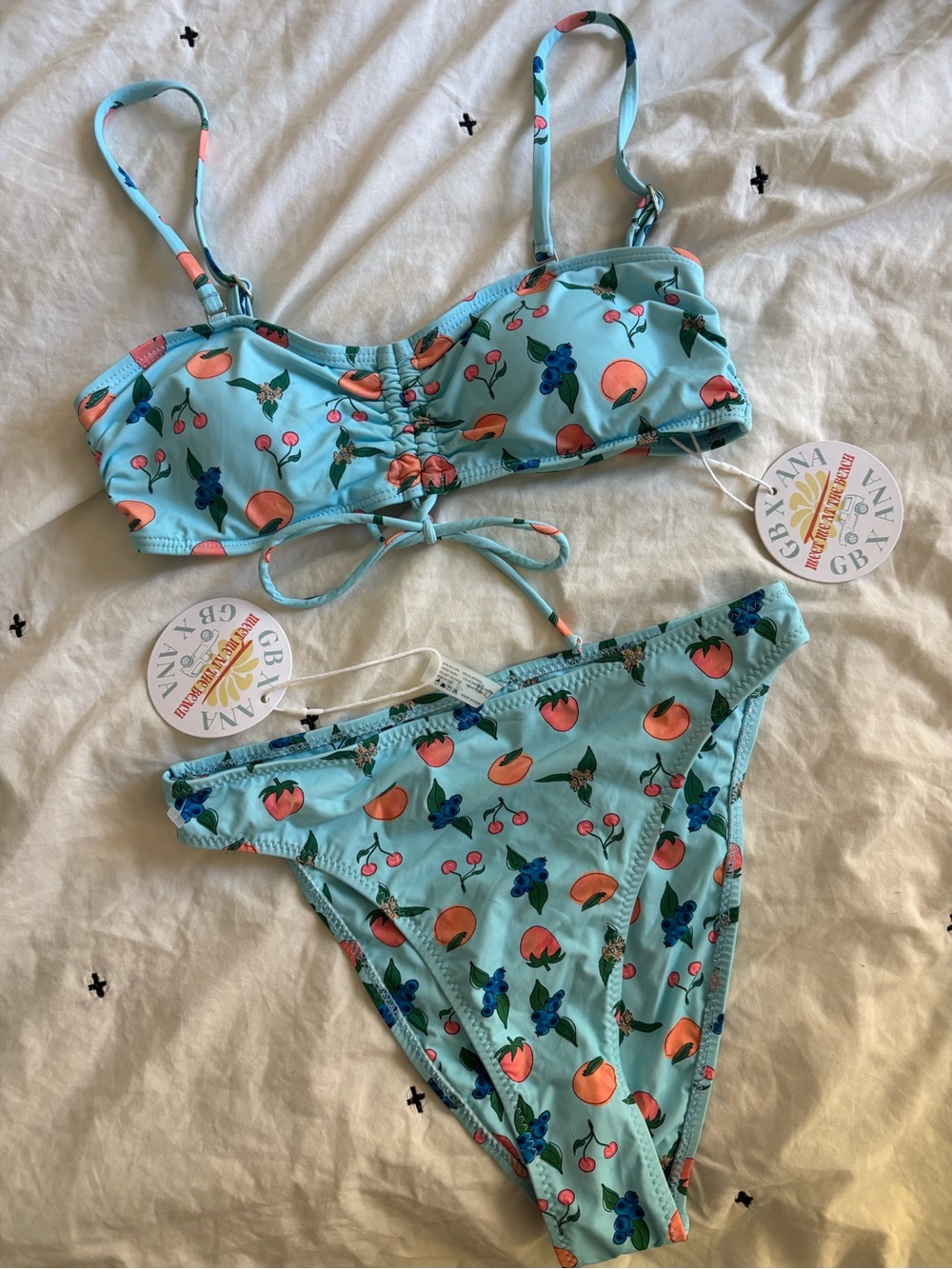 Grey Bandit x Ana two piece swimsuit in blue fruit